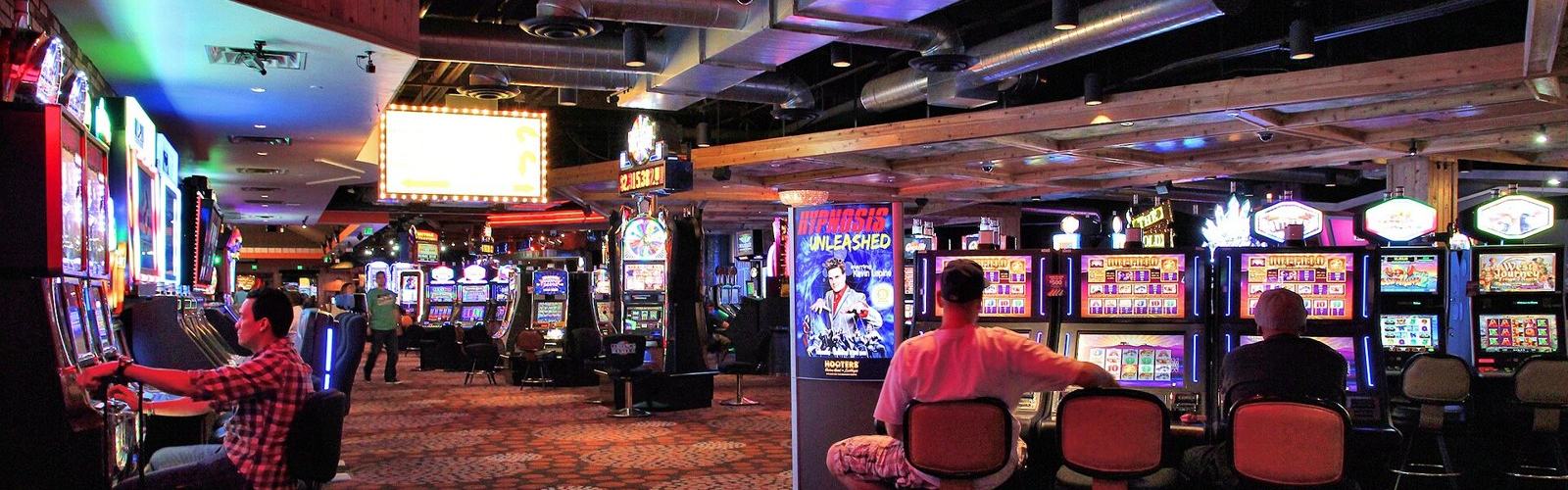 A floor of slot machines, the format most casino payback figures describe.